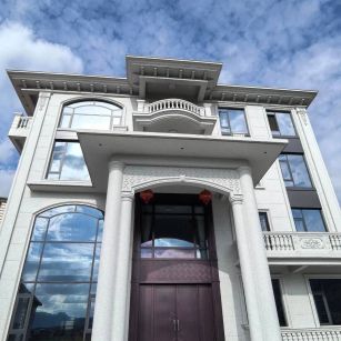 淮安白麻别墅外墙干挂石材效果示例