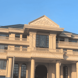 淮安黄金麻别墅外墙干挂石材效果示例