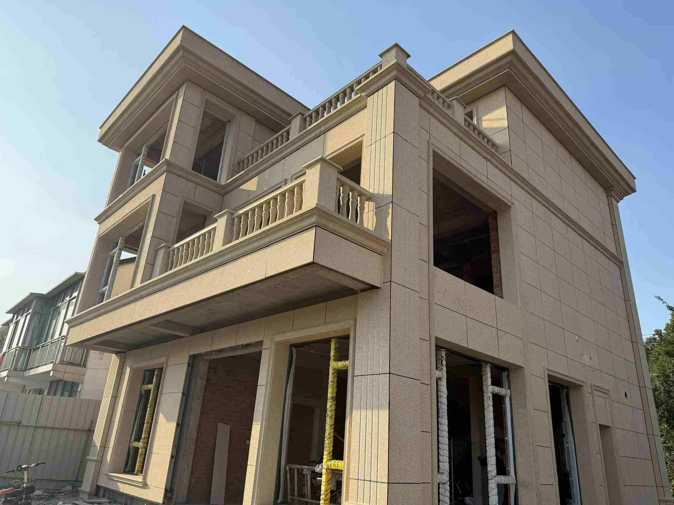 淮安 黄金麻花岗岩石材荔枝面外墙干挂效果展示